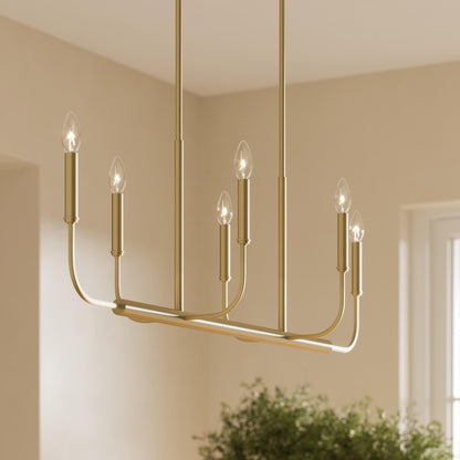 Progress Lighting Reines Brushed Gold Linear Chandelier shown in a dining room setting