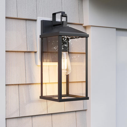 Progress Lighting P560406-31M Cantley Matte Black Outdoor Wall Lantern installed on exterior shingle wall daytime lifestyle