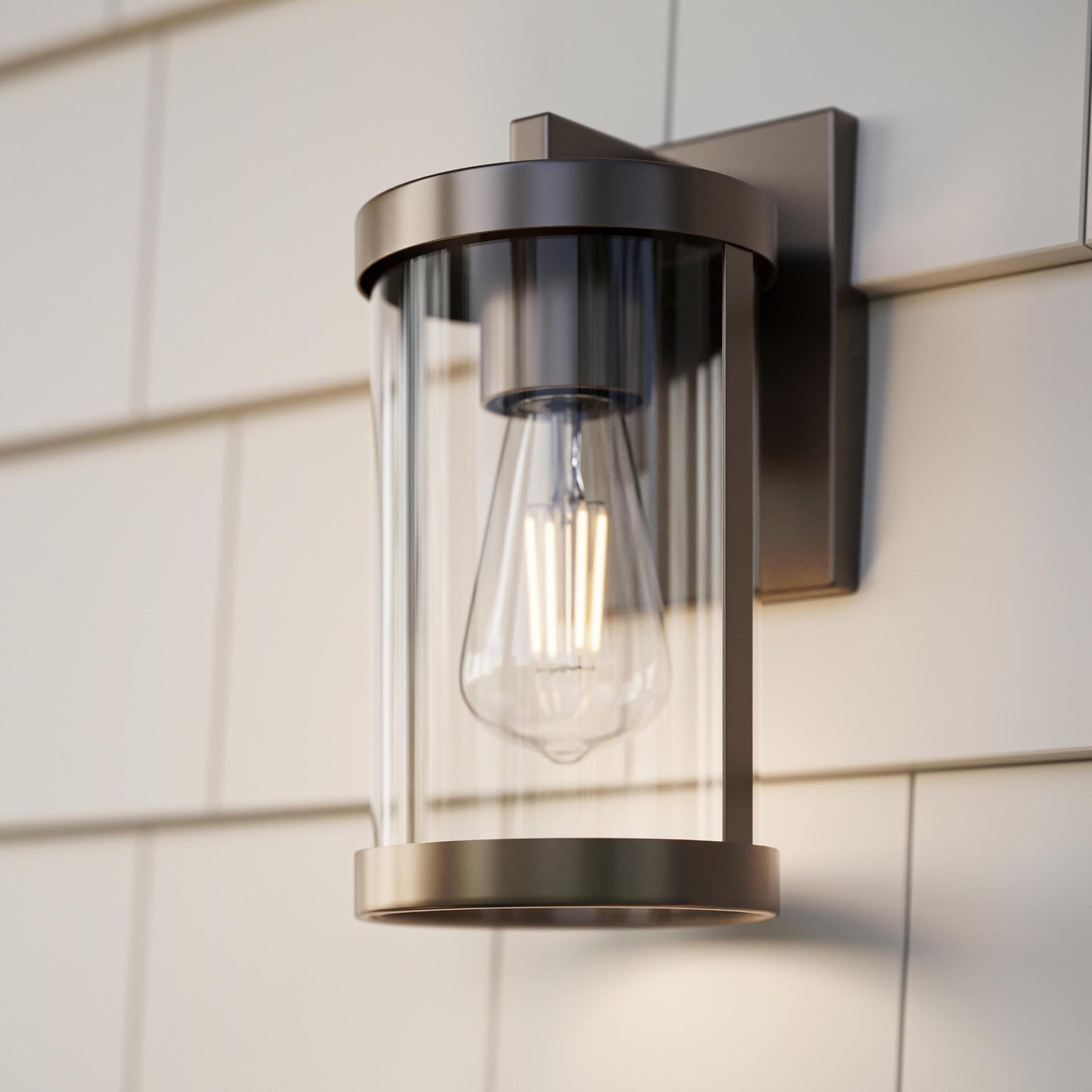Progress Lighting P560393-020 Kagen Antique Bronze Outdoor Wall Lantern Installed on Exterior Wall