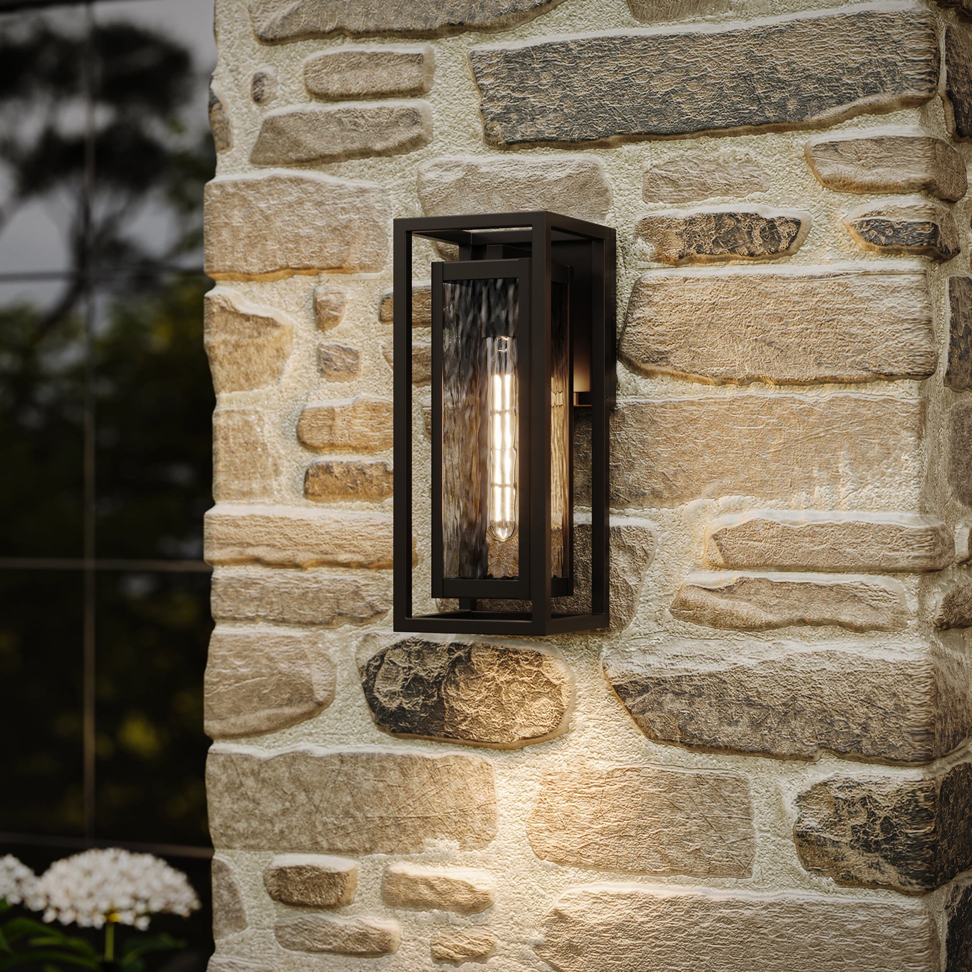Progress Lighting P560410-020 Shaw Outdoor Wall Lantern installed on exterior stone wall - lifestyle shot