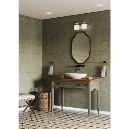 Progress Lighting Fessler 2 light vintage brass bath vanity wall light installed above bathroom mirror