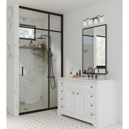 Progress Lighting Inspire 4 light bath vanity wall light in a bathroom setting