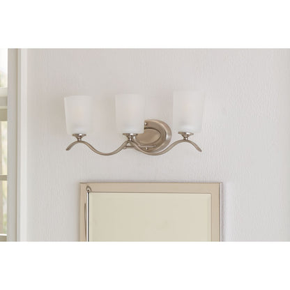 Progress Lighting Inspire 3 light brushed nickel bath vanity wall light installed above mirror