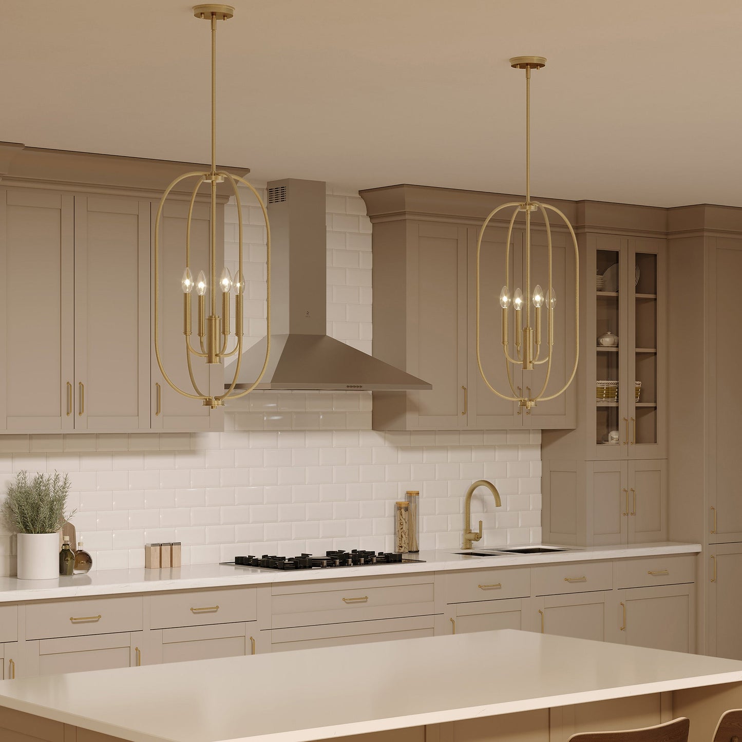 Progress Lighting P500510-191 Reines Brushed Gold Foyer Pendant shown in a kitchen setting at night