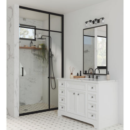 Progress Lighting Lassiter 4 light matte black bath vanity wall light in bathroom setting