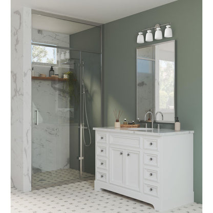 Progress Lighting Lexie four light bath vanity wall light installed in bathroom