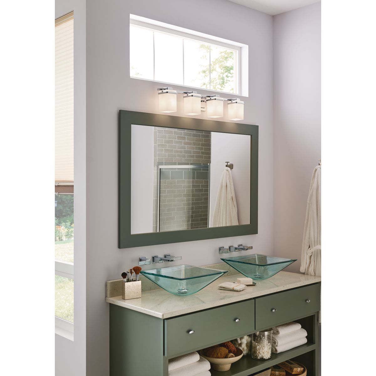Progress Lighting Metric 4 light bath vanity wall light installed above bathroom mirror