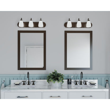 Progress Lighting P2708-20 Gather 3 Light Antique Bronze Bath Vanity Wall Light installed above bathroom mirrors in a lifestyle setting