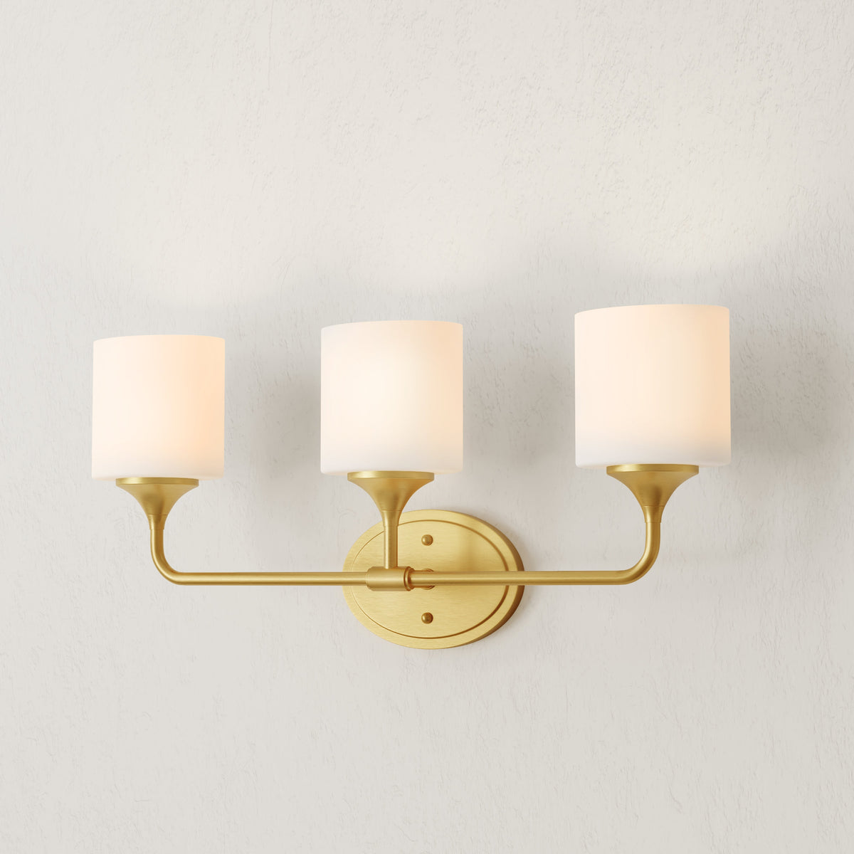 Progress Lighting P2803-191 Lynzie 3 light brushed gold bath vanity wall light illuminated