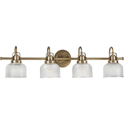 Progress Lighting Archie 4 light vintage brass bath vanity wall light with clear prismatic glass shades