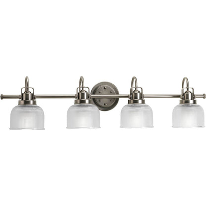Progress Lighting Archie 4 light bath vanity wall light in antique nickel with clear prismatic glass shades