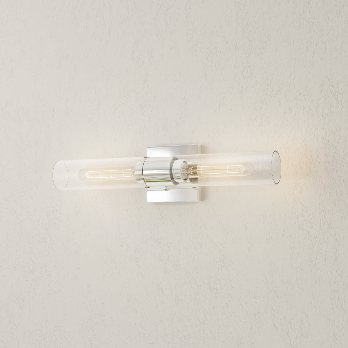 Progress Lighting Clarion polished chrome bath vanity wall light illuminated close-up