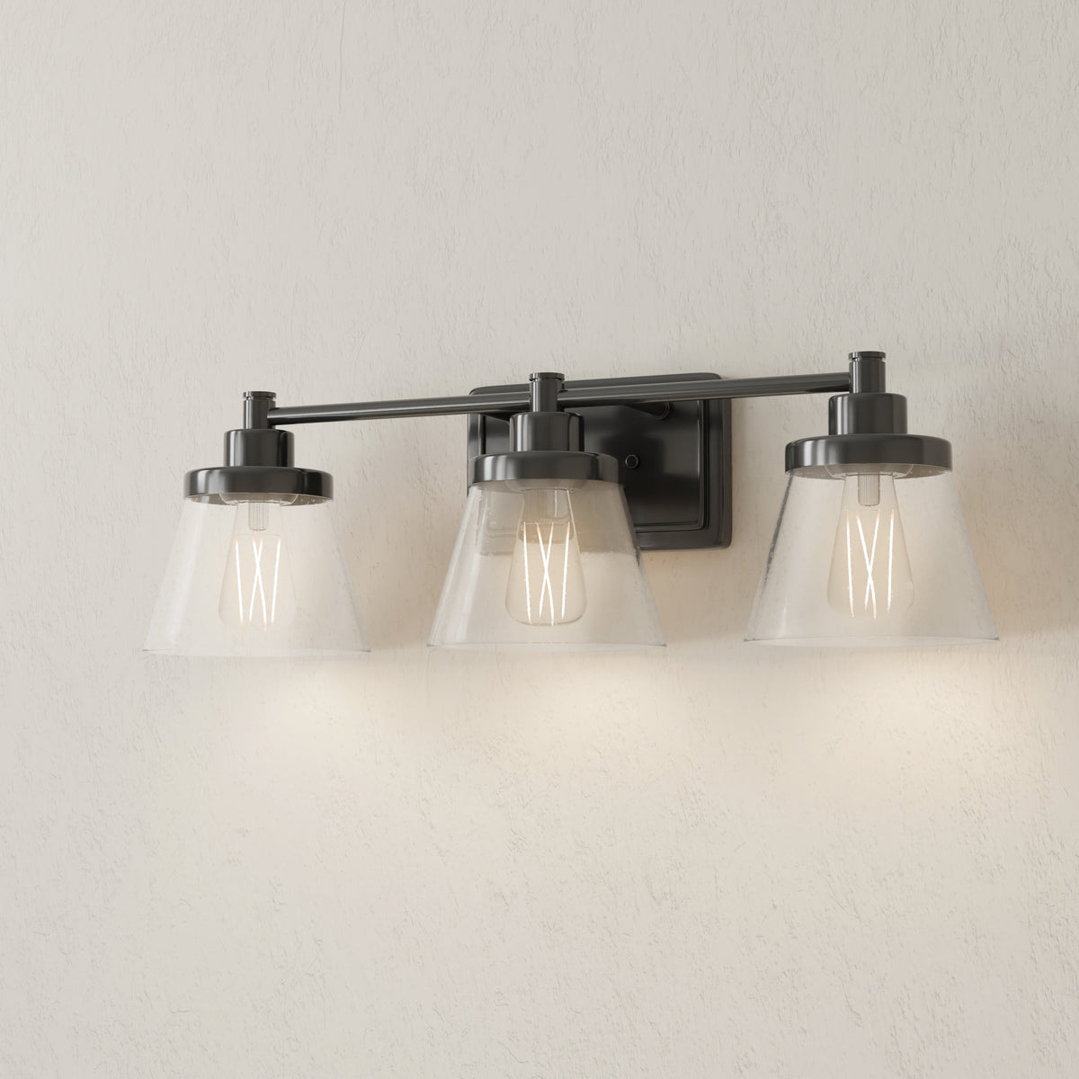 Progress Lighting Hinton 3 light matte black bath vanity wall light illuminated