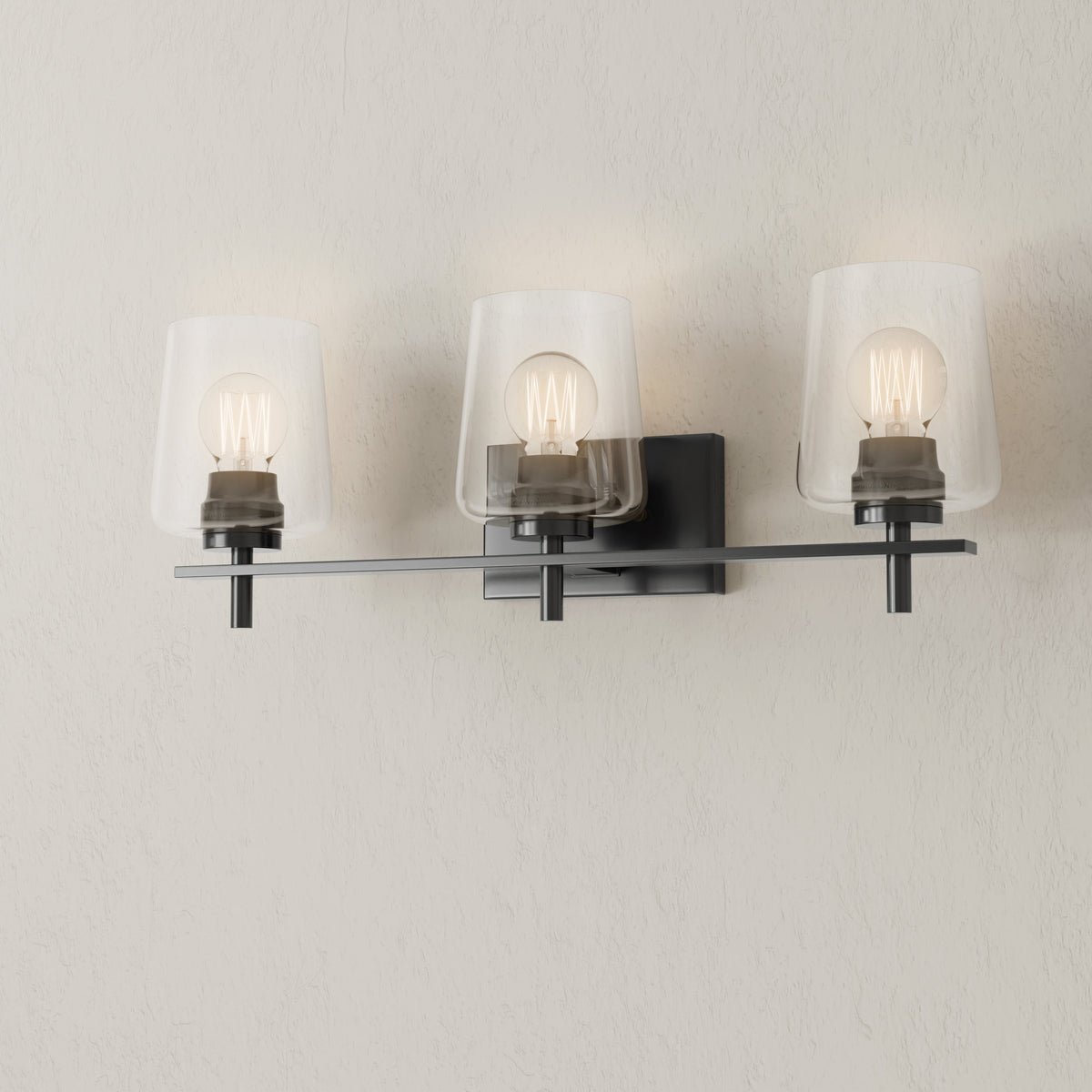 Progress Lighting Calais 3 light bath vanity wall light illuminated