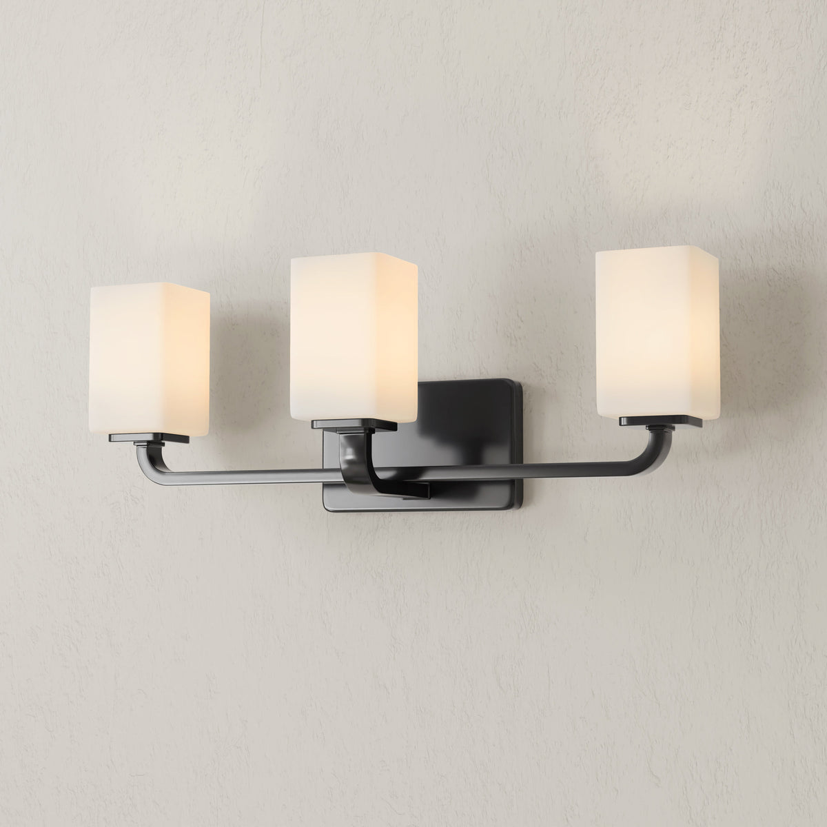 Progress Lighting P300370-31M Cowan 3 light matte black bath vanity wall light illuminated