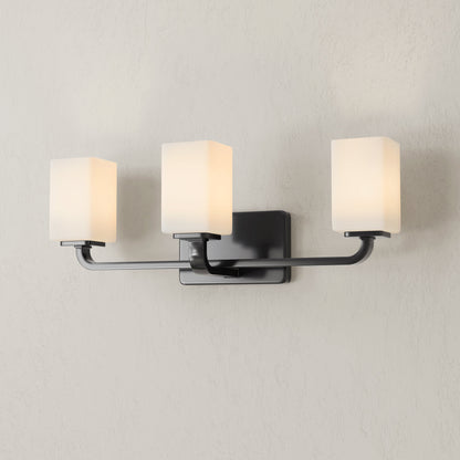 Progress Lighting P300370-31M Cowan 3 light matte black bath vanity wall light illuminated