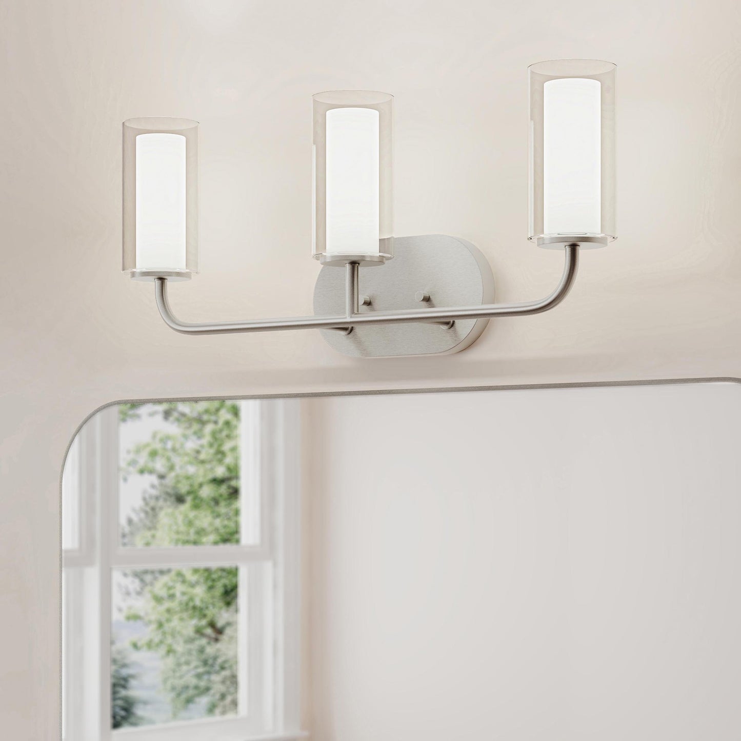 Progress Lighting P300576-009 Mack 3 Light Brushed Nickel Bath Vanity Wall Light installed above bathroom mirror