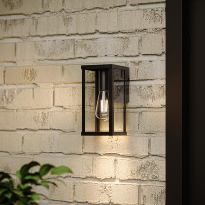 Progress Lighting P560397-31M Ryle Matte Black Wall Lantern installed on exterior brick wall