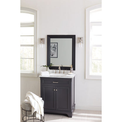 Progress Lighting Rushton brushed nickel bath vanity wall lights installed beside bathroom mirror