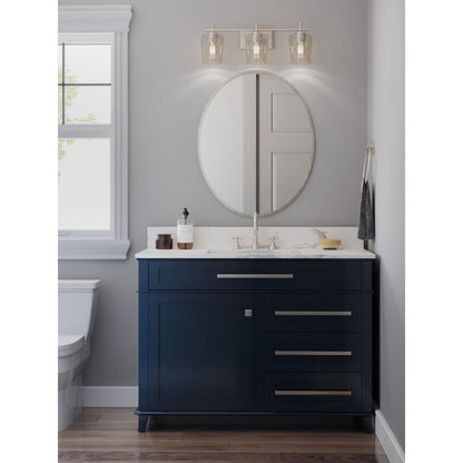Progress Lighting Calais 3 light brushed nickel bath vanity wall light installed above bathroom mirror