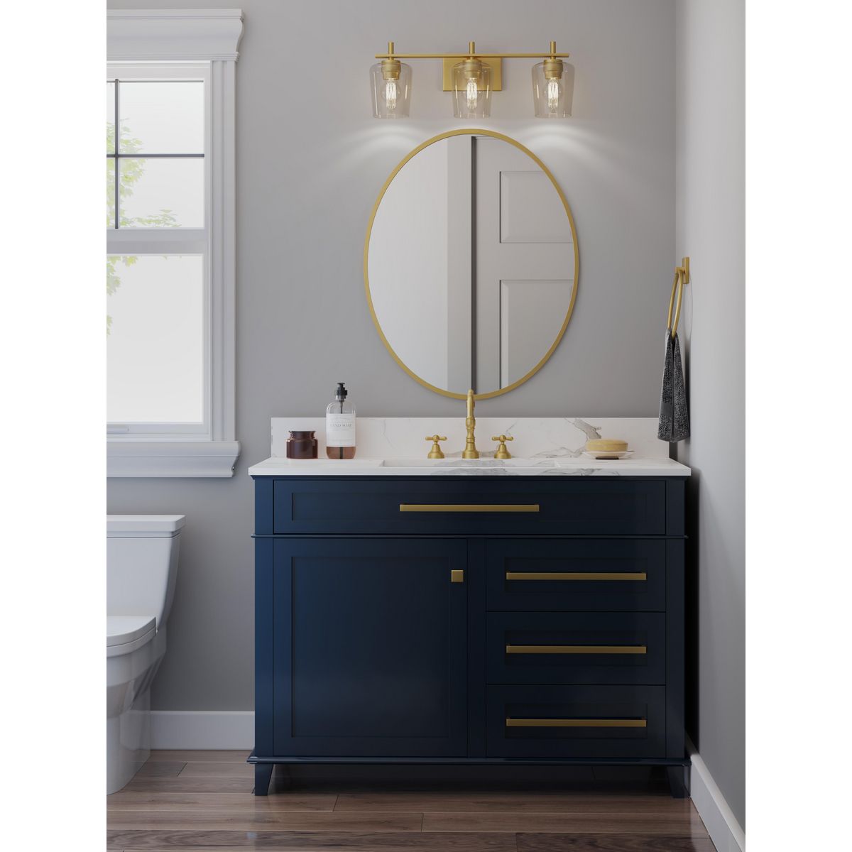 Progress Lighting Calais 3 light vintage brass bath vanity wall light in bathroom