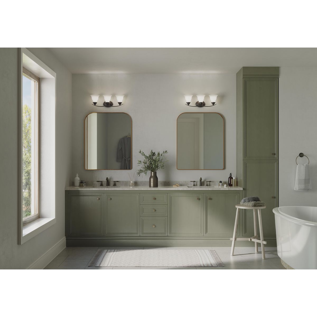Progress Lighting Trinity 3 light antique bronze bath vanity wall light in bathroom setting