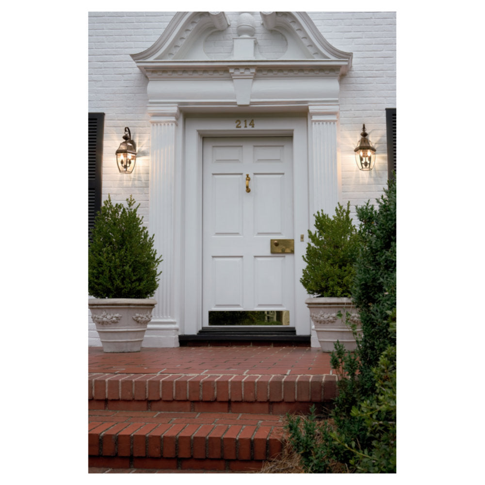 Generation Lighting Lancaster 1 light antique bronze outdoor wall lantern installed beside front entry door