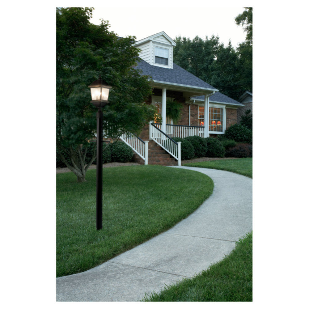 Generation Lighting Kent outdoor lantern installed along a walkway