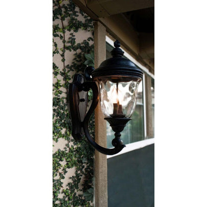 Maxim Lighting 40495WGOB Carriage House VX Oriental Bronze Outdoor Wall Lantern installed on exterior wall with ivy