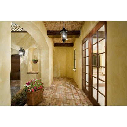 Maxim Lighting Carriage House VX Outdoor Wall Lantern lifestyle shot in covered outdoor entryway hallway