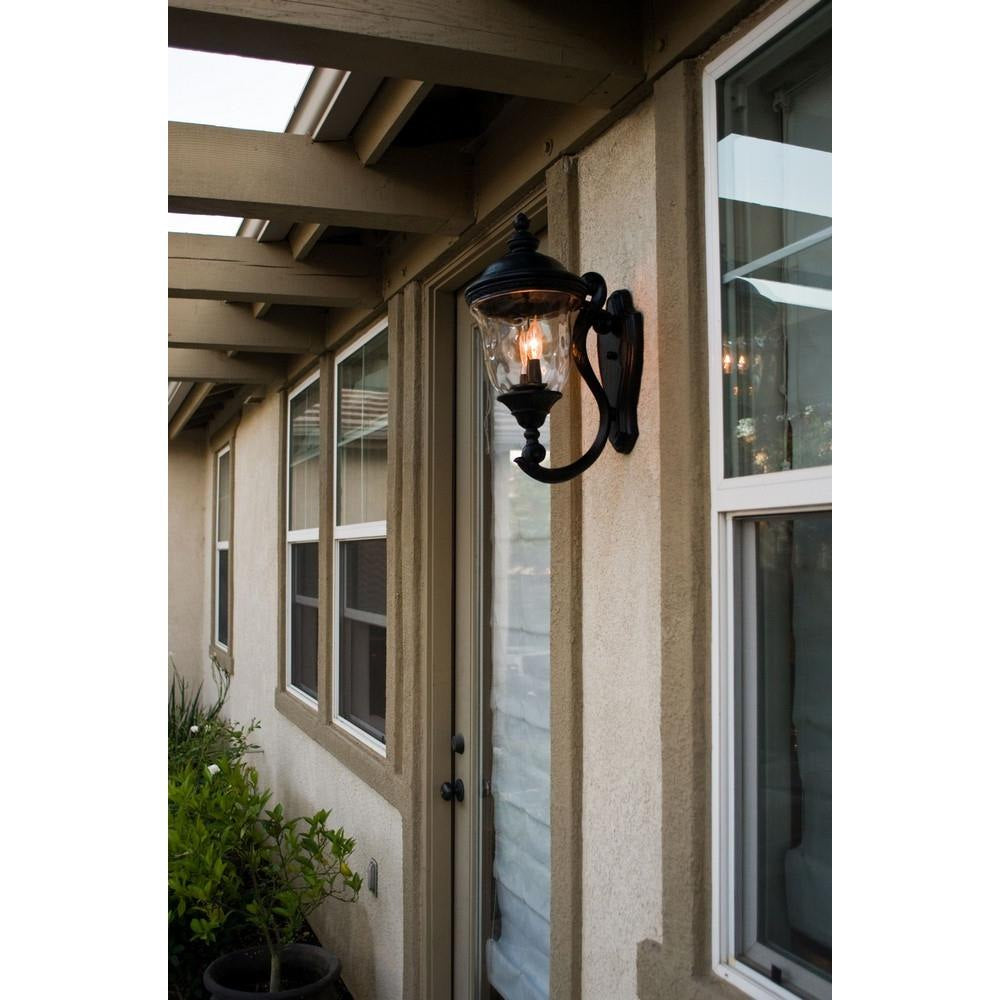 Carriage House VX collection lifestyle photo - outdoor wall sconce at covered porch entryway