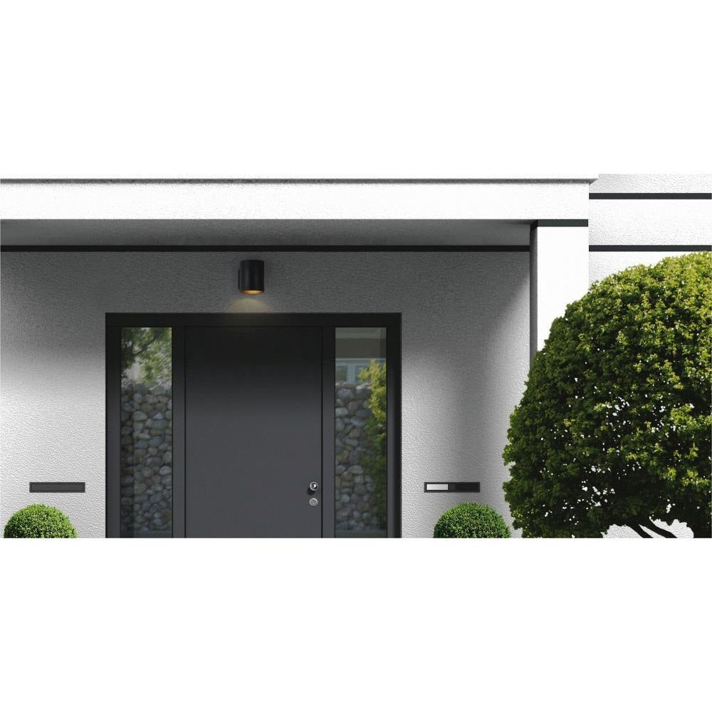 Maxim Lighting Outpost Outdoor Wall Light lifestyle installation above front door entry